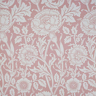 A detail of wallpaper with patterns of roses and carnations in white and soft, desatured pink.