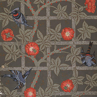 A detail of wallpaper with a repeating pattern that shows birds and flowers perched amidst climbing vines on a garden trellis. Highlights of red-orange and soft blue stand out against the wallpaper's background of muted tones of grey-brown.